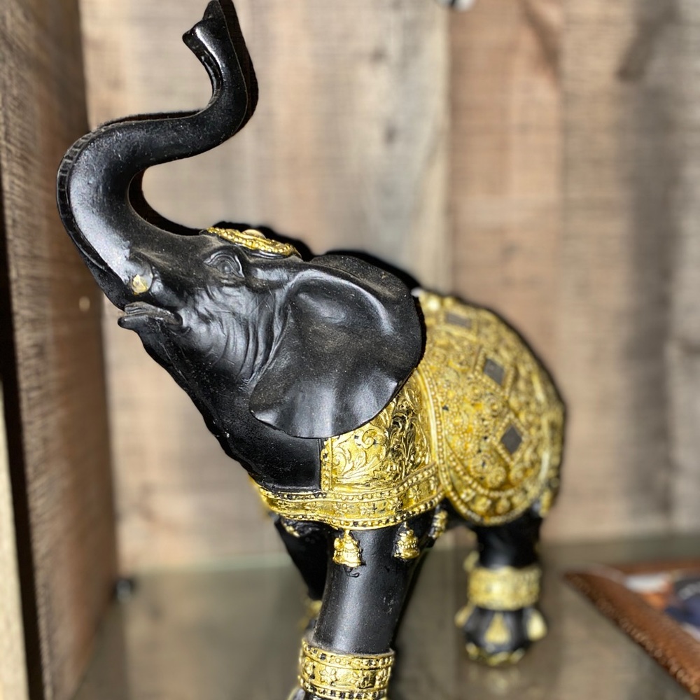 Black and gold elephant